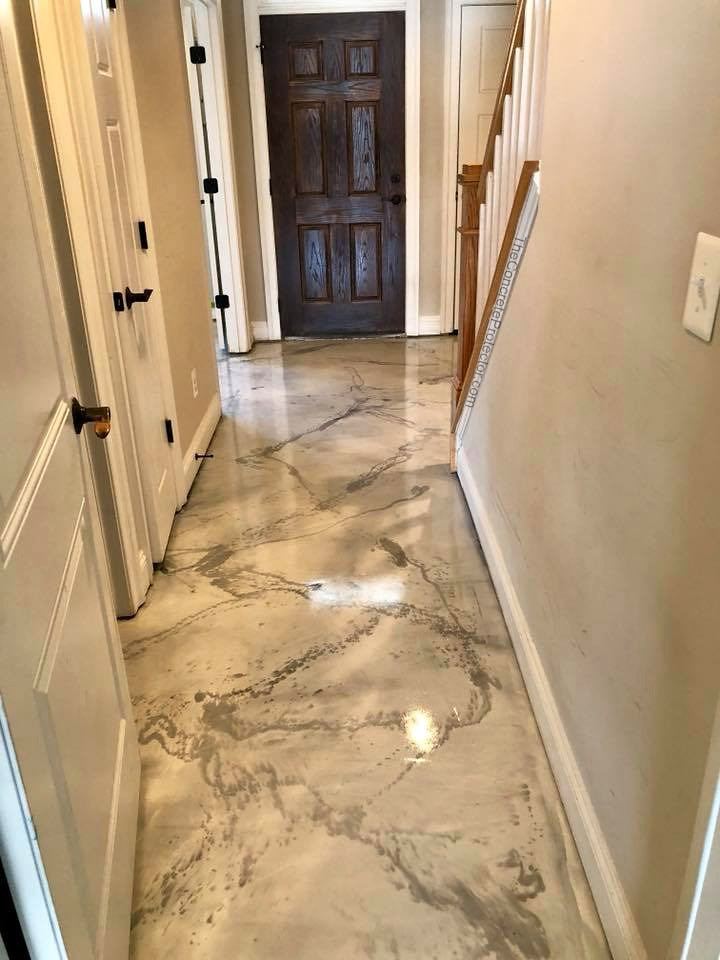 Marble-look epoxy floor with soft veining